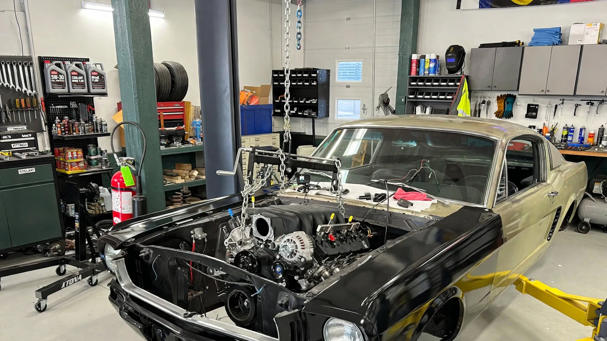 1969 Ford Mustang with a 7.3L Godzilla V8 engine swap