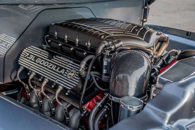 Whipple supercharged Ford 7.3L Godzilla engine in a Ford F-100 engine bay